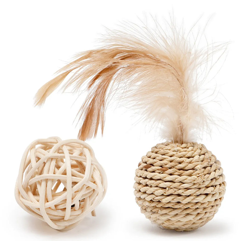 Two cat toys: faux feather ball measuring 4x9cm and hollow rattan ball with 3.5cm diameter