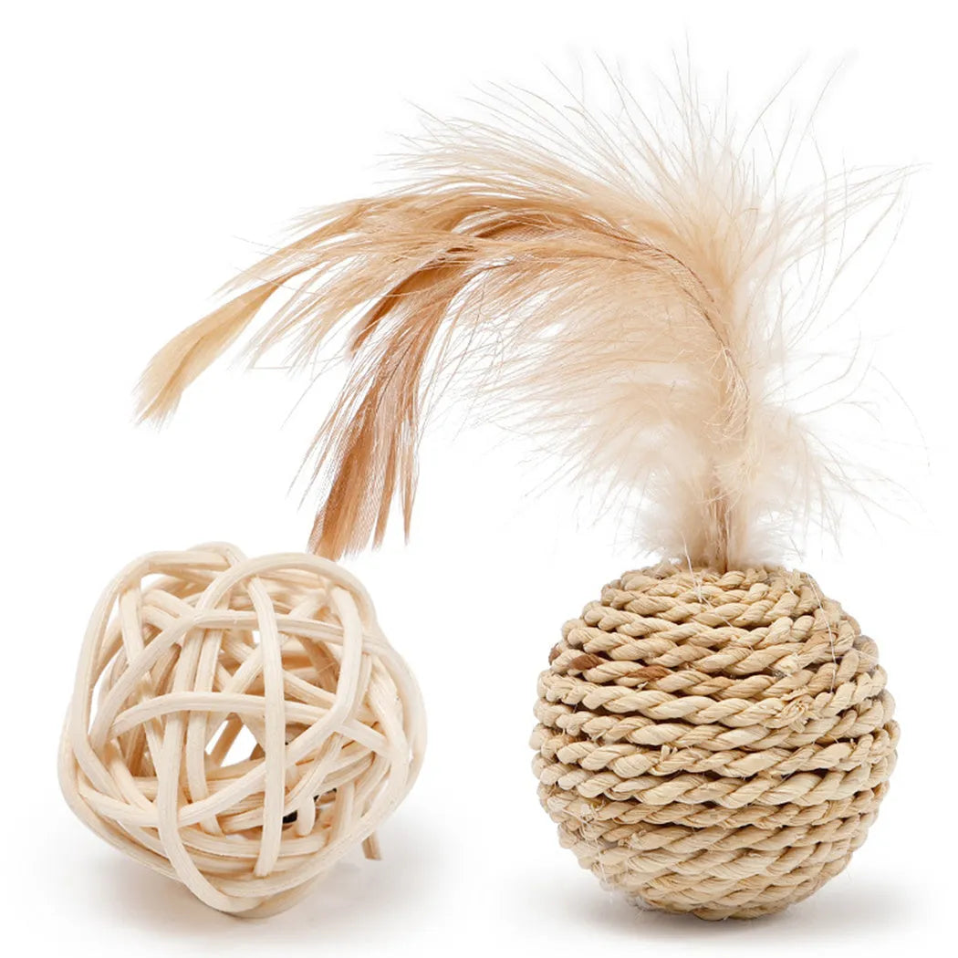 Two cat toys: faux feather ball measuring 4x9cm and hollow rattan ball with 3.5cm diameter