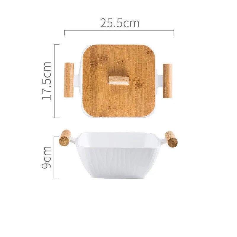 Ceramic serving bowl with lid in irregular modern shape, heat-resistant porcelain construction