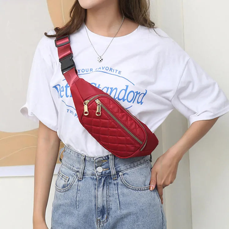 Rhombus nylon fanny pack for women in solid colour with zipper pockets and single soft handle for crossbody or waist wear.