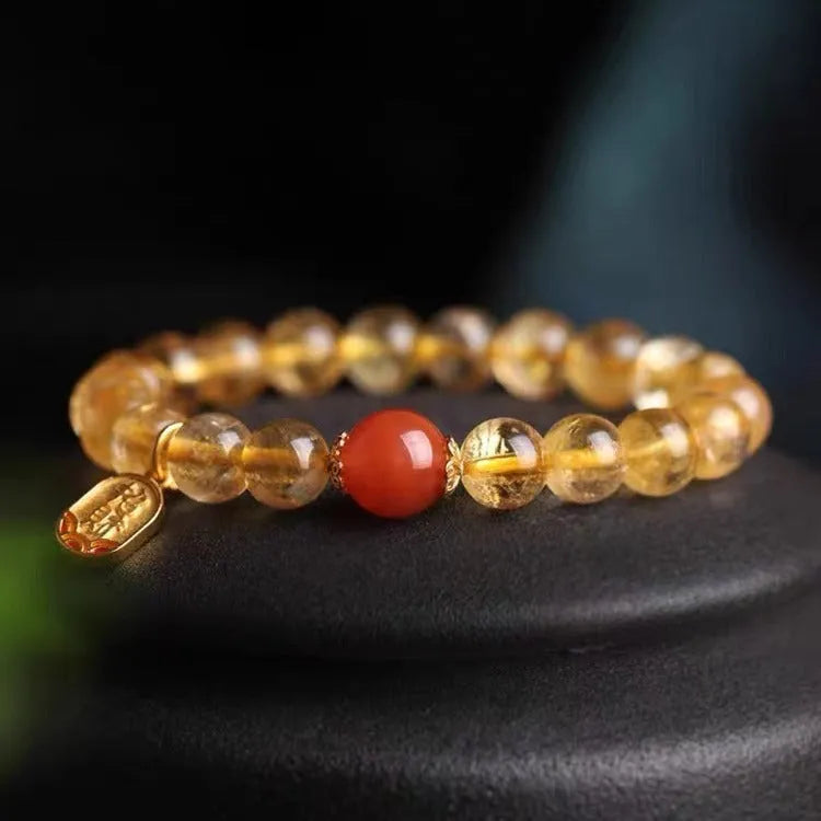Polished red agate bead bracelet on gold-plated chain, showing bead size options of 6mm, 8mm and 10mm.