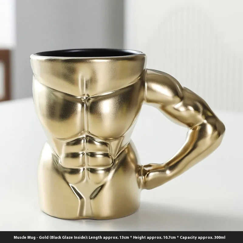 Matte black ceramic mug with muscle man design and 300ml capacity.