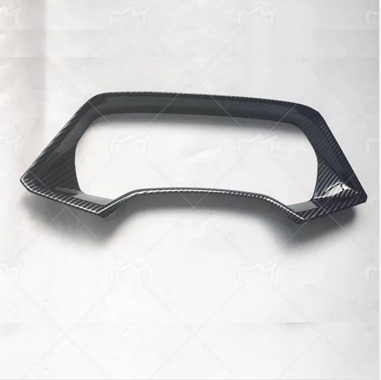 BMW X5 dashboard decorative frame in carbon fibre or peach wood finish