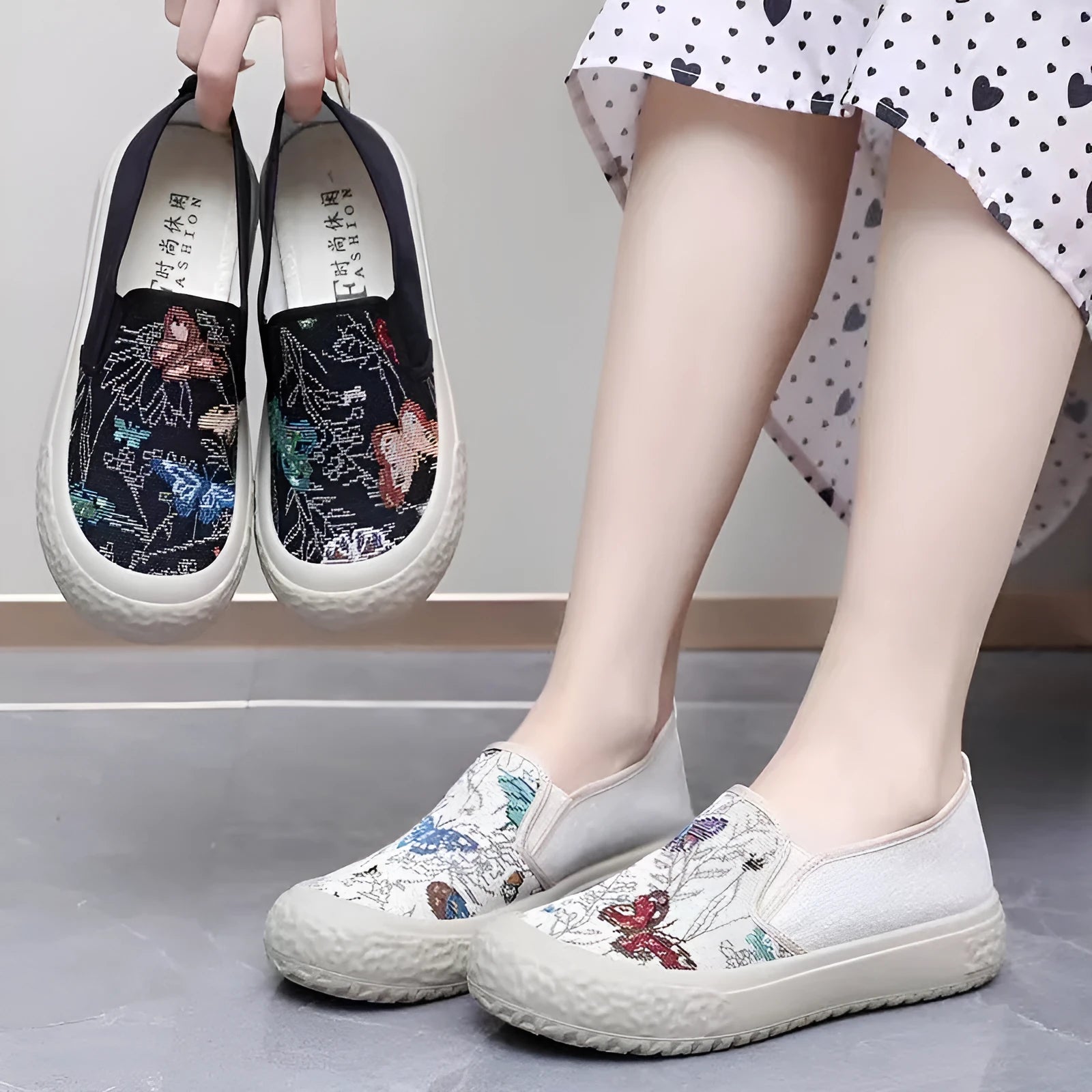 Women's black and white canvas slip-on shoes with round toe and decorative sewing thread details