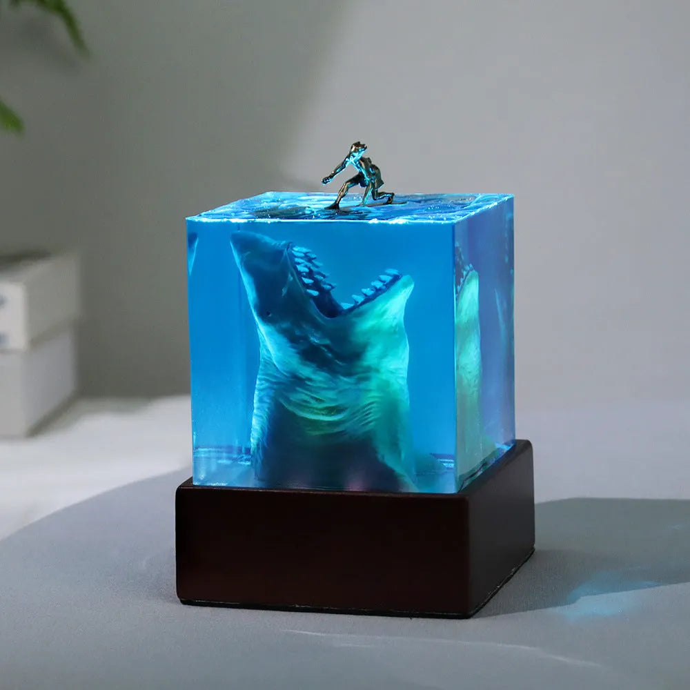 Ocean Shark Surfer resin night light ornament with integrated LED holder in 5cm or 8cm size, showing handcrafted shark surfing scene