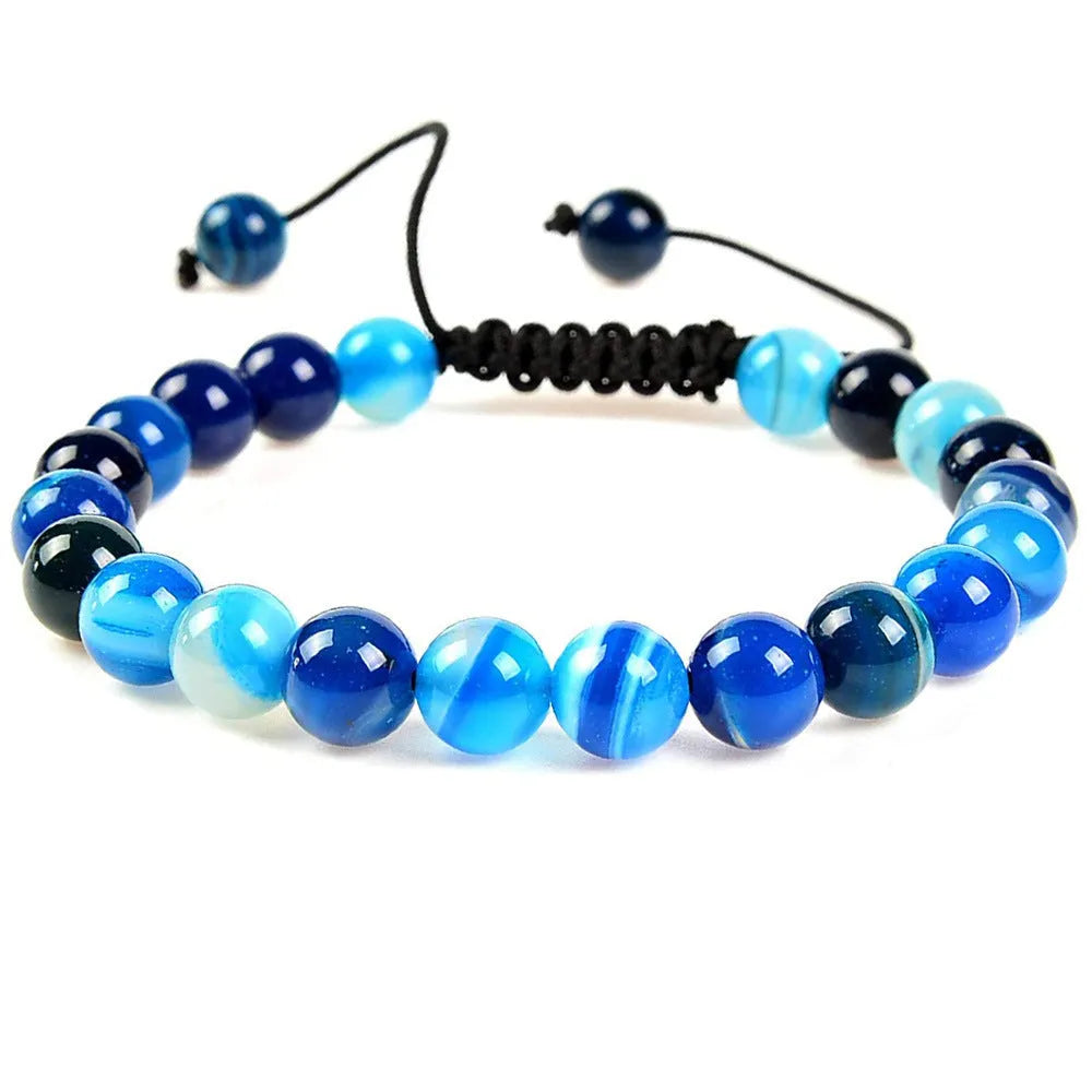 Women's flat knot braided healing bracelet with geometric texture and gemstone beads
