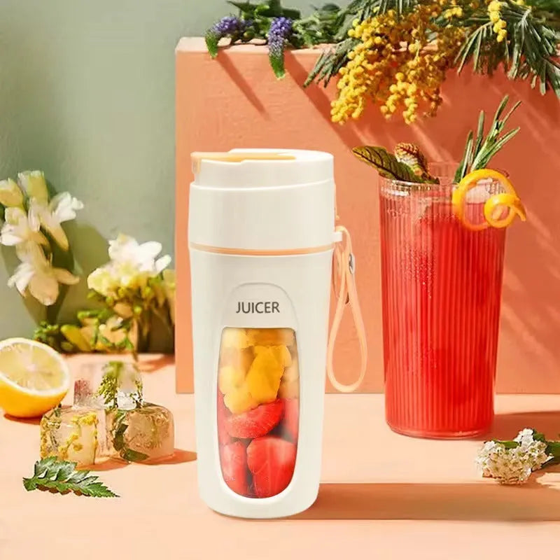 Portable USB charging electric blender cup in grass green, light purple, and fresh orange colours.