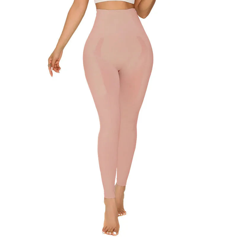 Women's black belly contracting yoga trousers with seamless design on a mannequin
