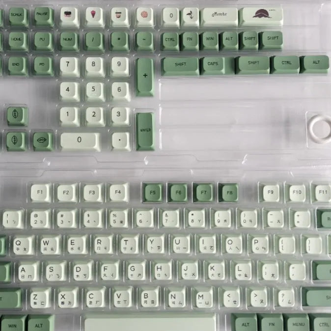 124 Matcha green PBT keycaps with white dye-sublimated legends, arranged in a keyboard layout.