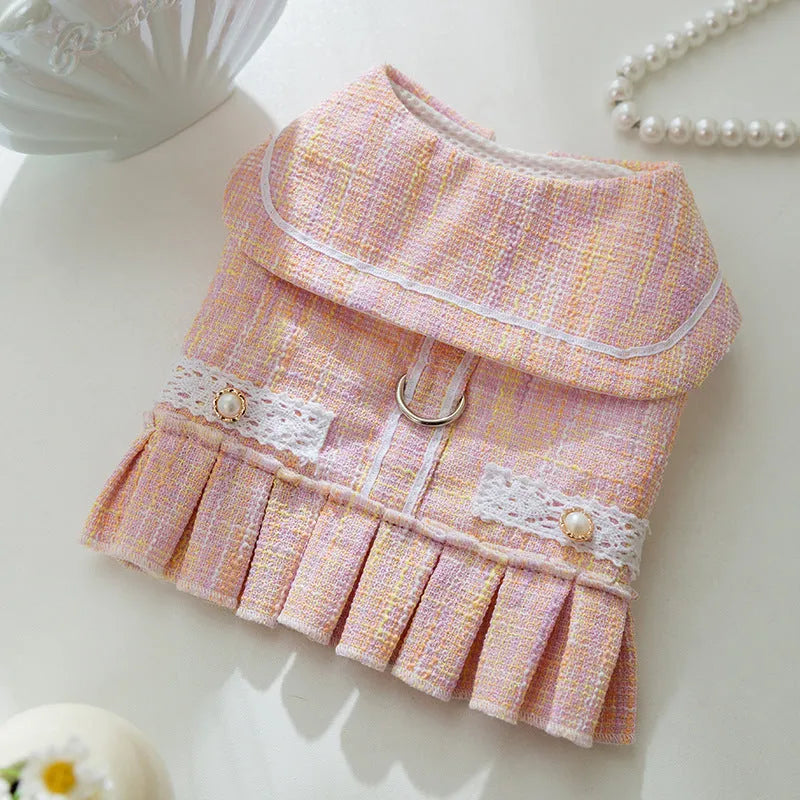 Small dog or cat clothing in pink or purple with ruffled sleeves, showing four size options for pets 1.5kg to 7.5kg