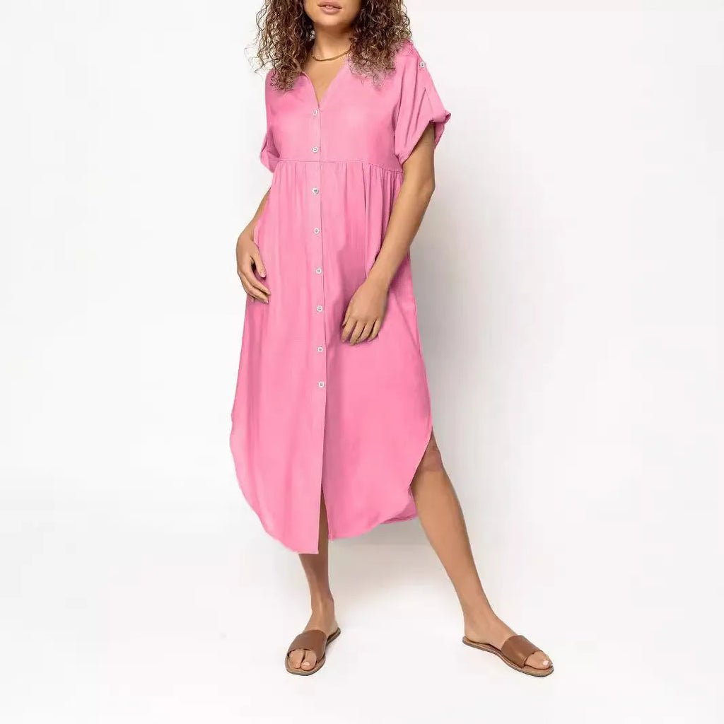 Loose-fit mid-length dress with button front in polyester fabric, available in multiple colours and sizes.