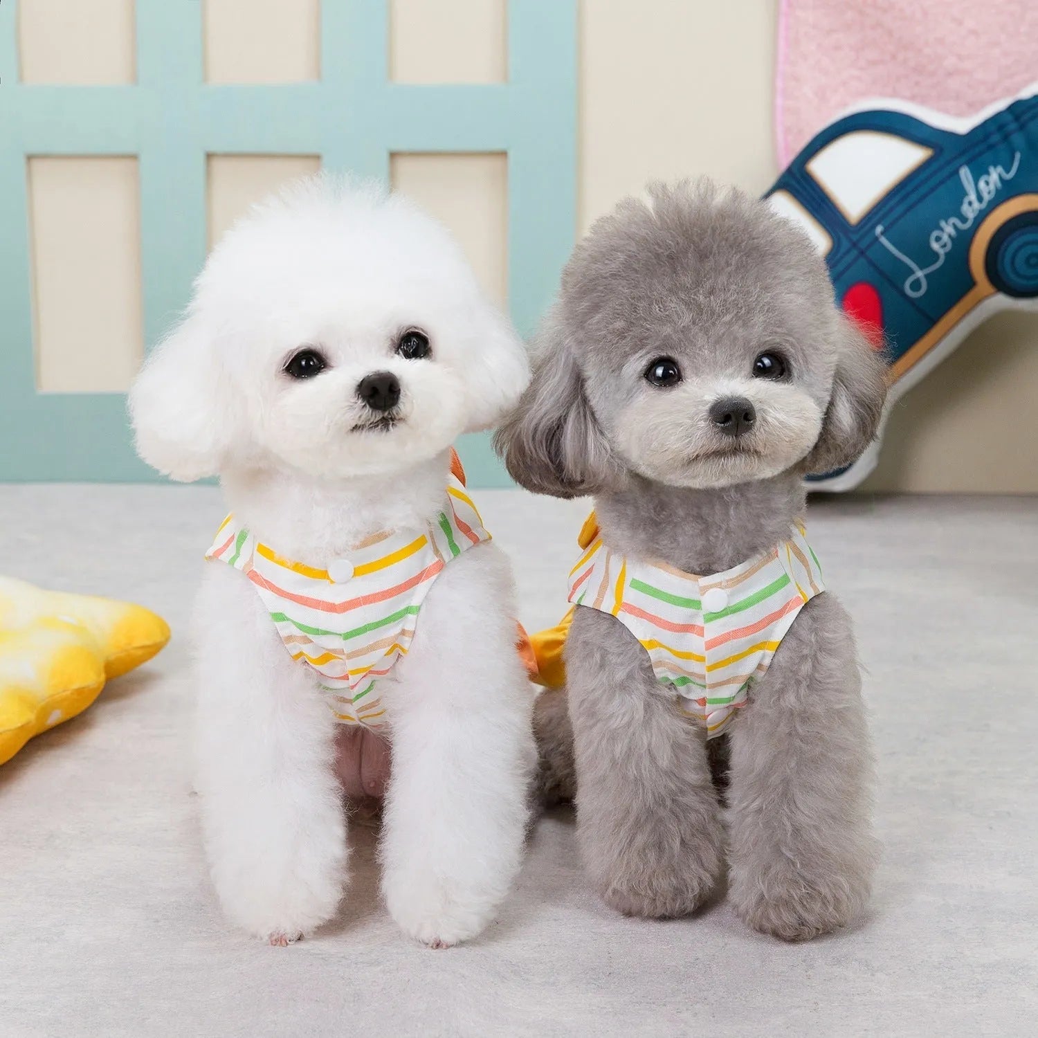 Orange and yellow striped patchwork cotton skirt for dogs on mannequin