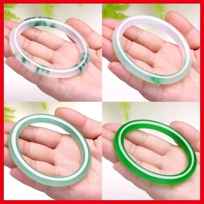 Women's jade bracelet with ice-like emerald appearance and floating flower patterns in multiple colour options