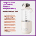 Wireless portable baby milk mixer with thermostatic cup and glass body, 86x210mm, shown in white, pink, blue or yellow.