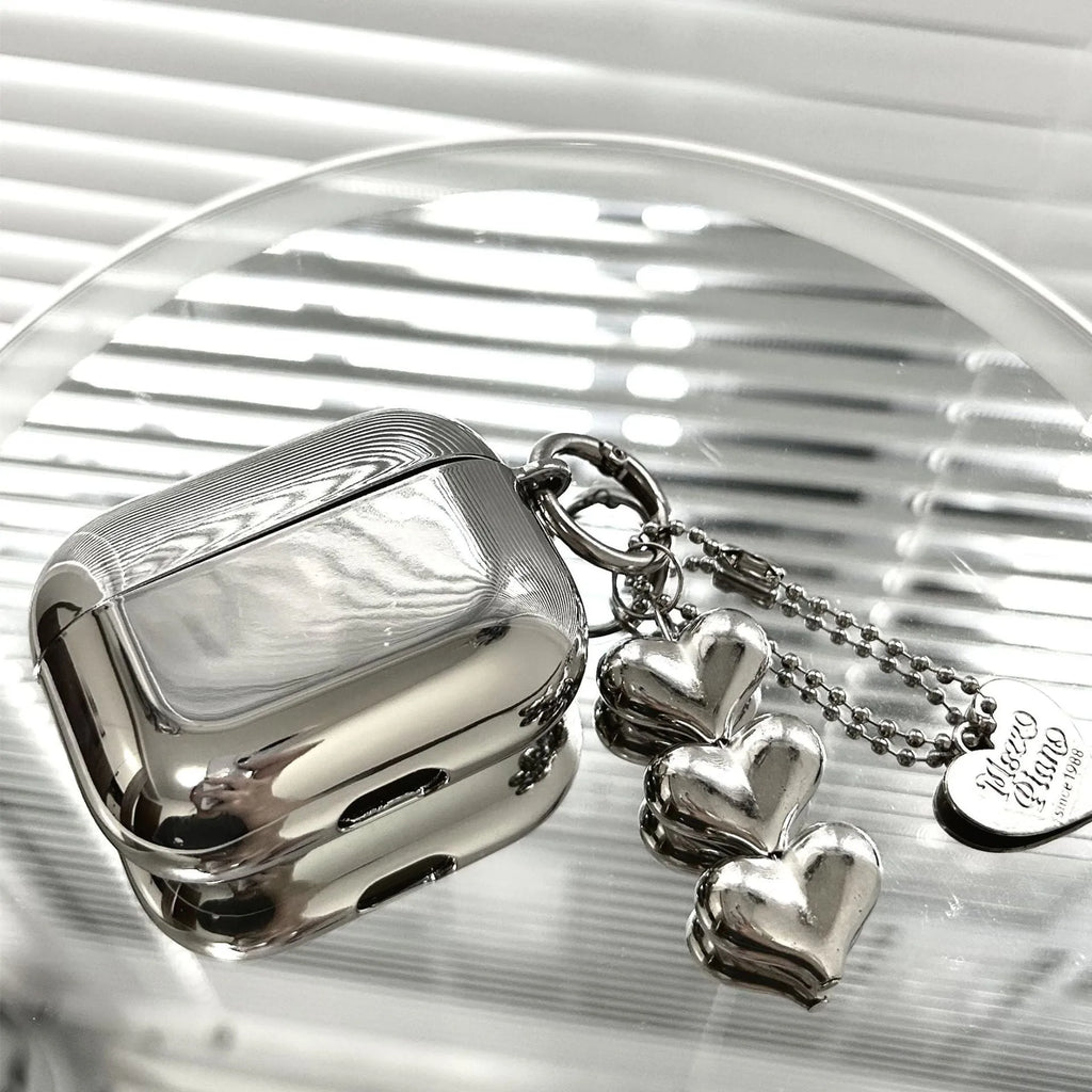 Electroplated TPU headphone case with heart pendant and bracelet chain decorative elements