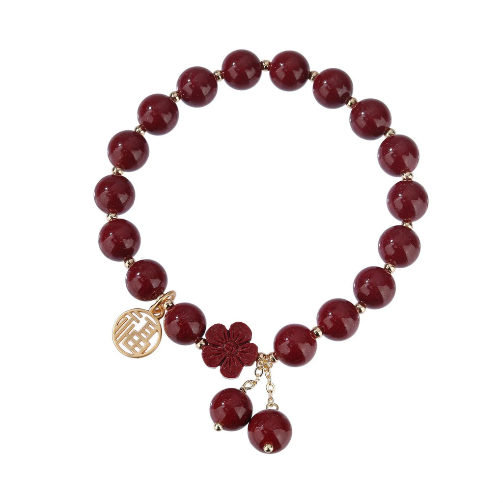 Women's purple gold sand cinnabar bracelet with fu character and peach blossom design on adjustable band