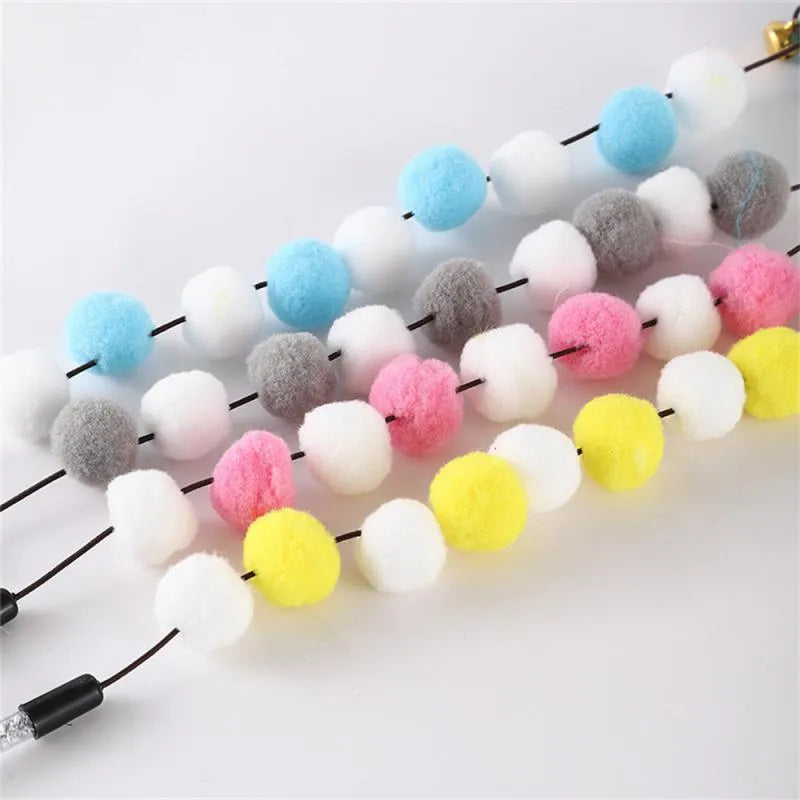 31cm long cat teaser rod with feather and bell attachments in multiple colour options