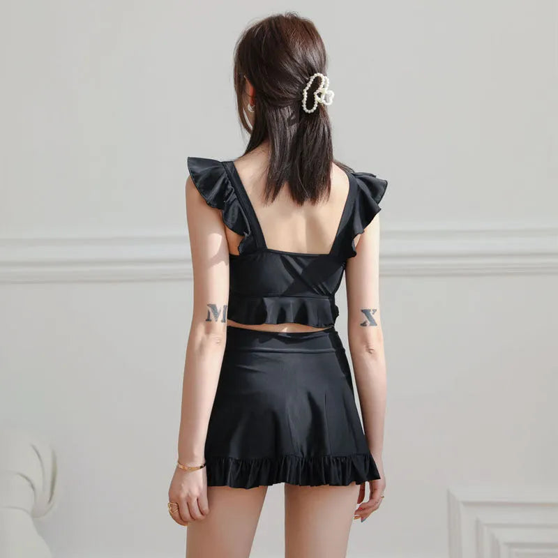 Black nylon swimsuit for women with split brief design