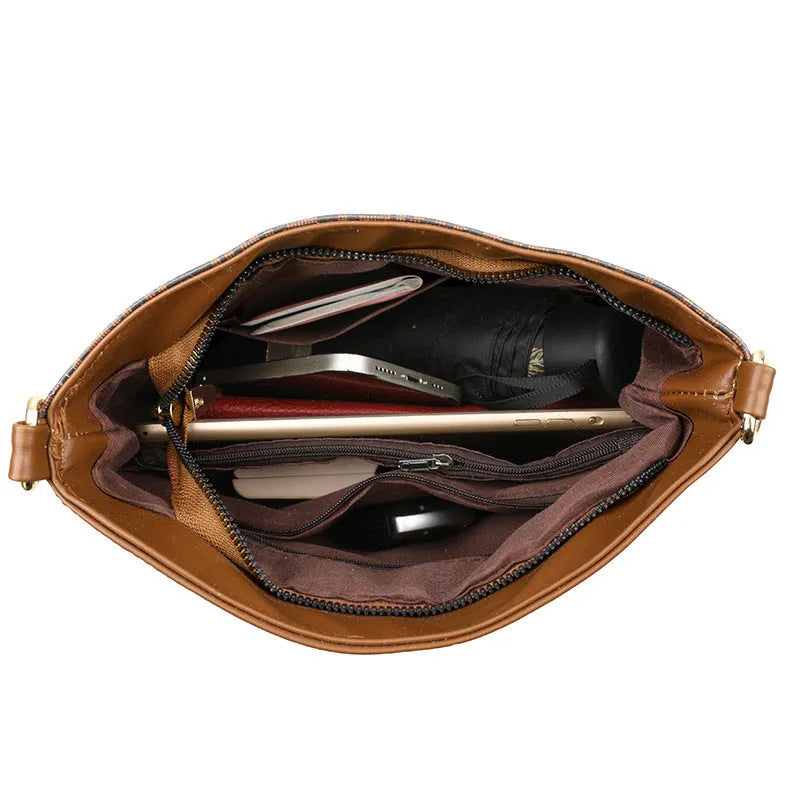 Brown retro style soft leather messenger bag with multiple compartments and sewing thread detailing