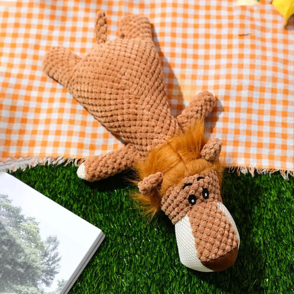 Green plush dog toy with corn kernel texture design for teeth cleaning and interactive sound feature