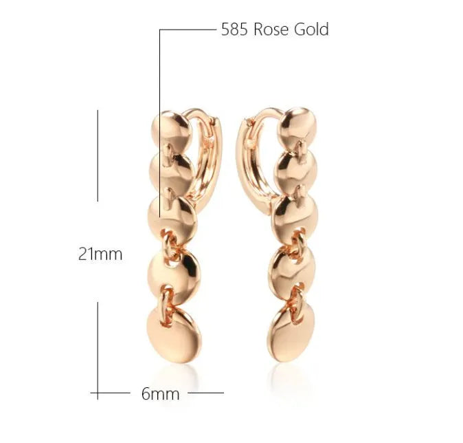 Gold-plated copper circle earrings with hand-woven texture, measuring 6cm in length
