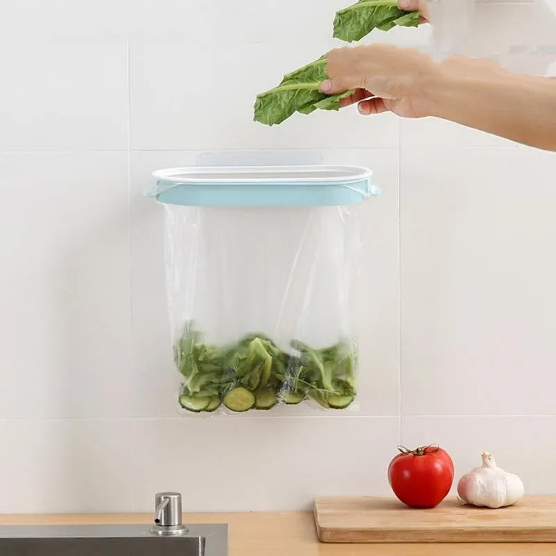 Blue plastic kitchen garbage bag storage rack on a cabinet shelf