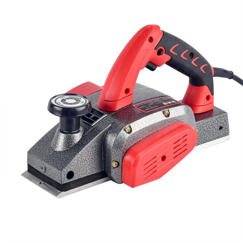 Red electric push planer with aluminium body, 82mm planing width, for woodworking tasks
