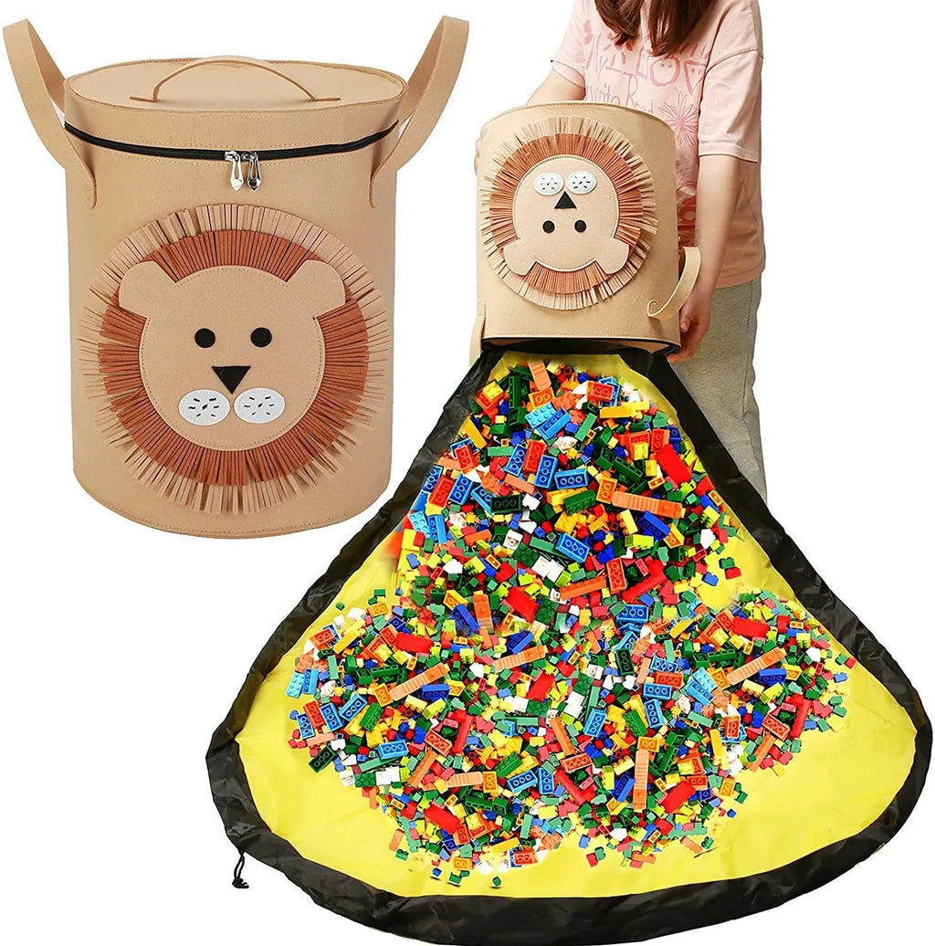 Green felt storage cube with pull rope, unfolded as a play mat on a living room floor
