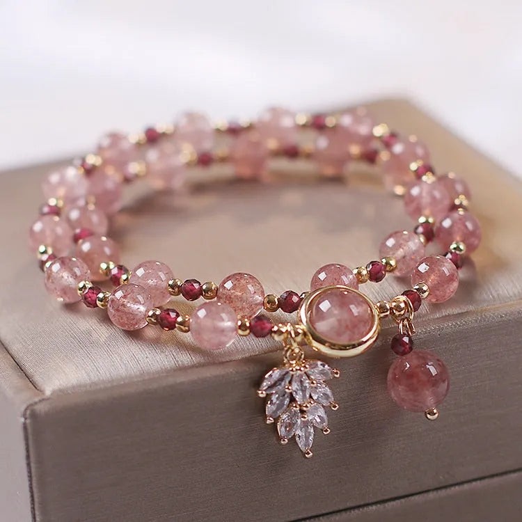 Women's double layer strawberry quartz bracelet with lucky cat charms in red cat's eye flowers colour