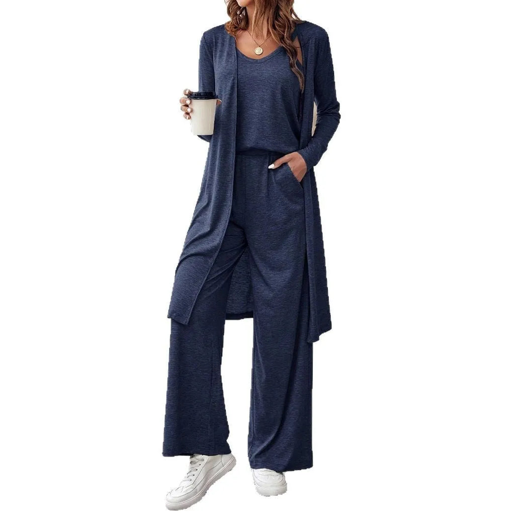 Women's blue polyester casual suit set with trousers, long sleeve top, and suspenders on hanger