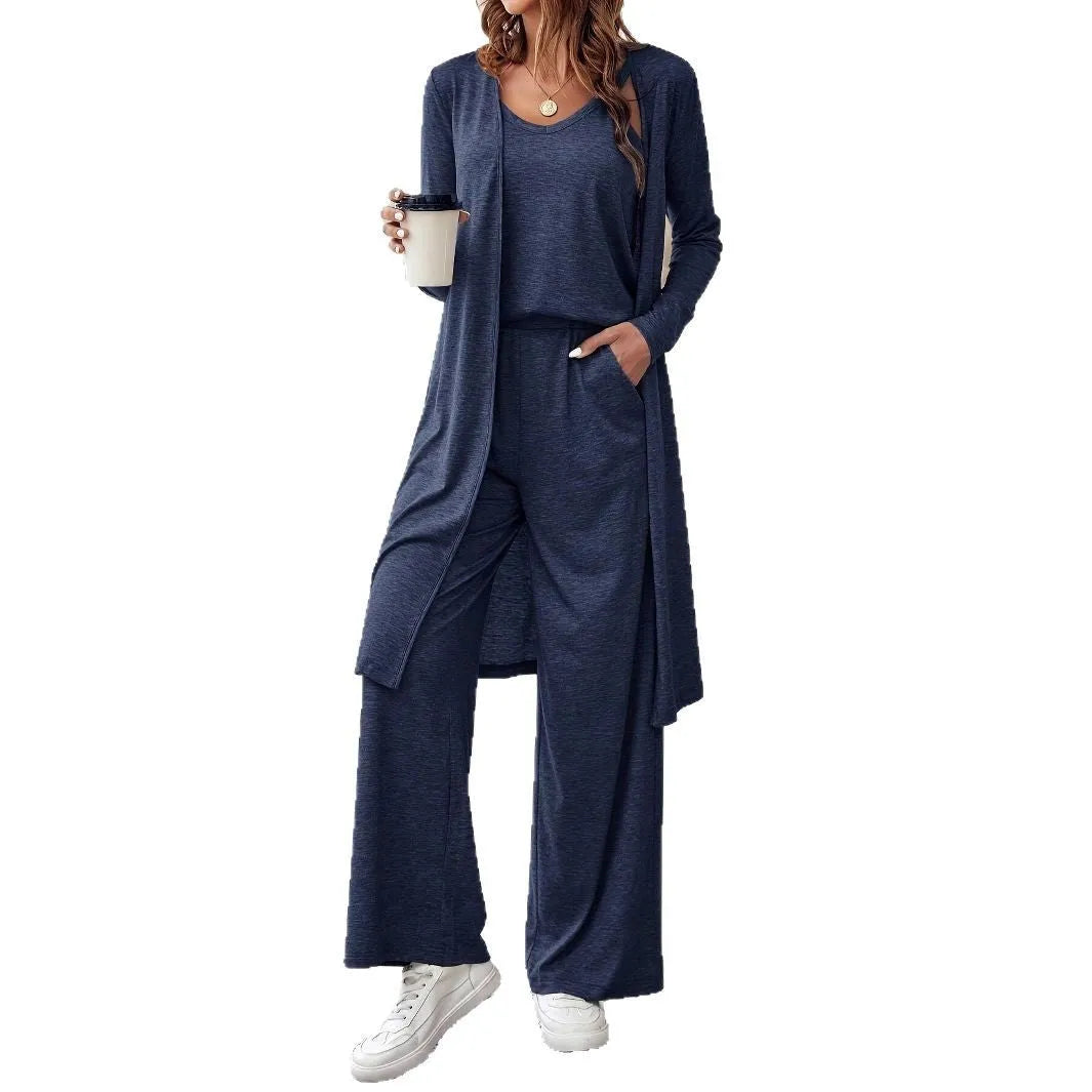 Women's blue polyester casual suit set with trousers, long sleeve top, and suspenders on hanger