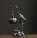 Chinese style gourd-shaped incense coil burner in copper alloy with dragon and phoenix design, painted blue or red top.
