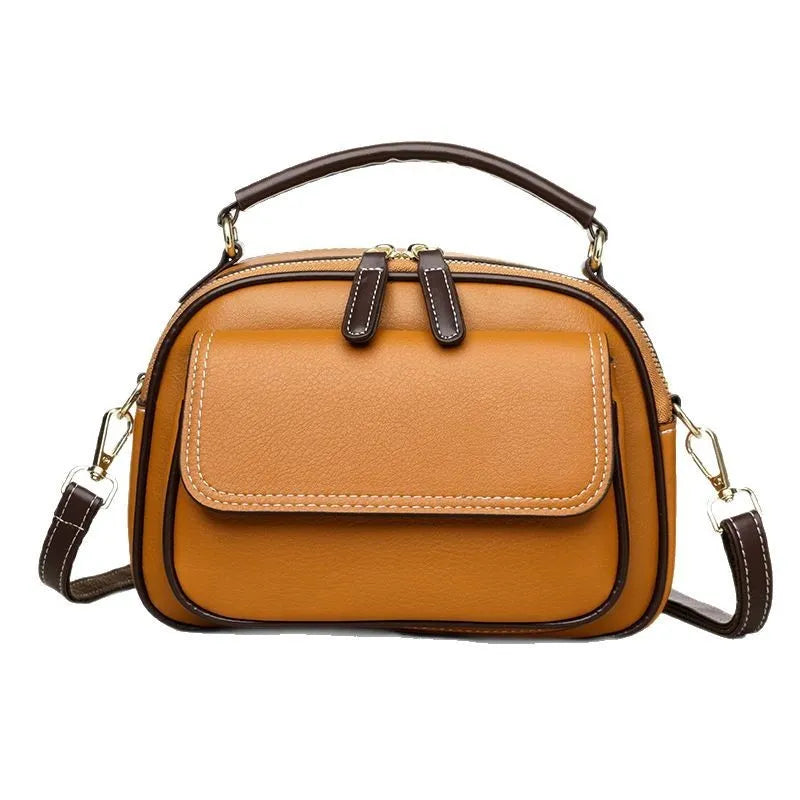 Women's square cross-body shoulder bag in black, green, or orange with double shoulder straps