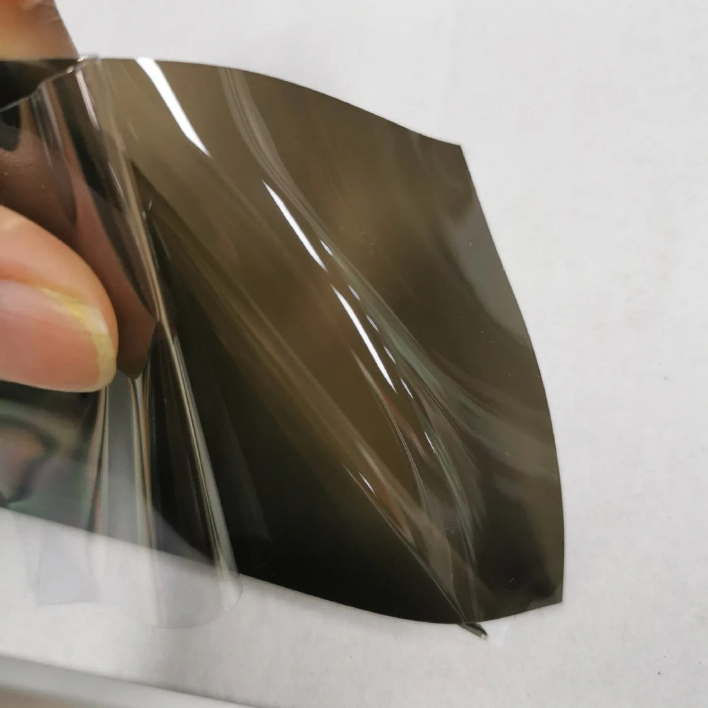 30cm wide car headlight protective film roll showing TPU material and colour options including dark gray, black, and brown variants