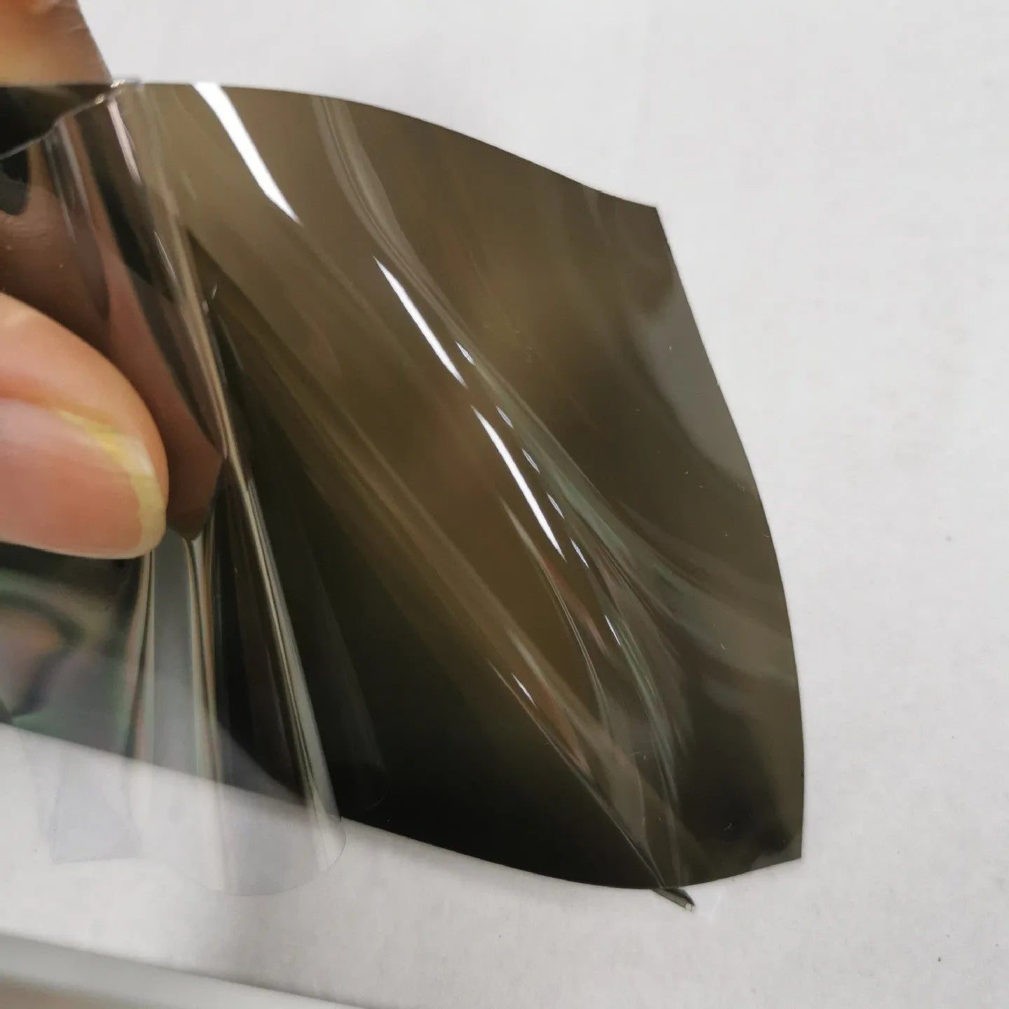 30cm wide car headlight protective film roll showing TPU material and colour options including dark gray, black, and brown variants