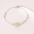 Women's Hetian jade bracelet with Peace Buckle clasp in antique style, made from 925 silver