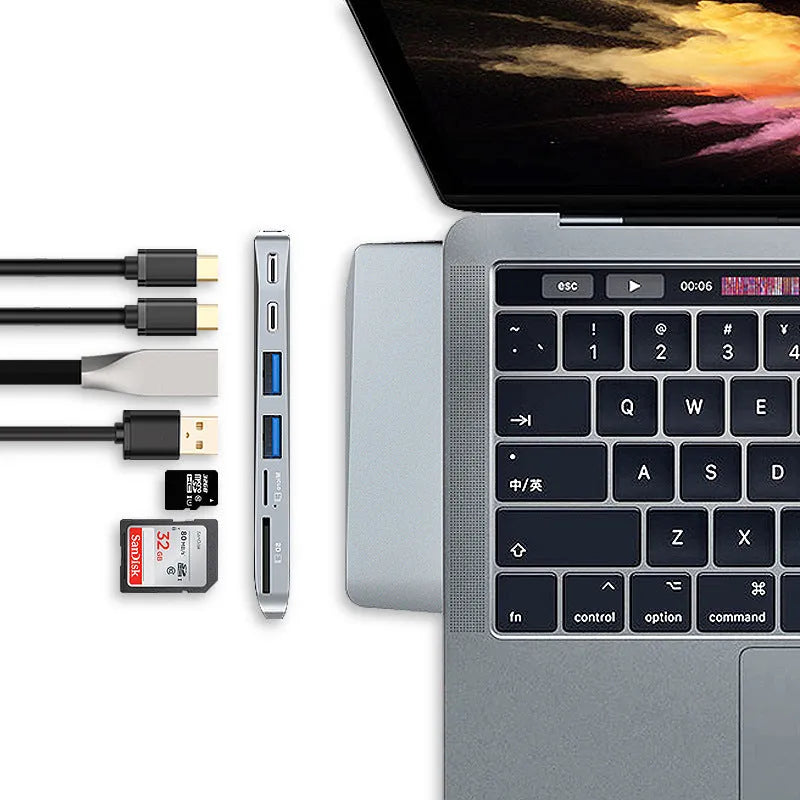 An 8-in-1 USB-C hub with dual plugs for MacBook Pro, showing USB, HDMI, and card reader ports.