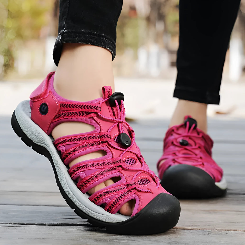 Women's black leather mesh sandals with elastic band and rubber sole, shown in size 38.