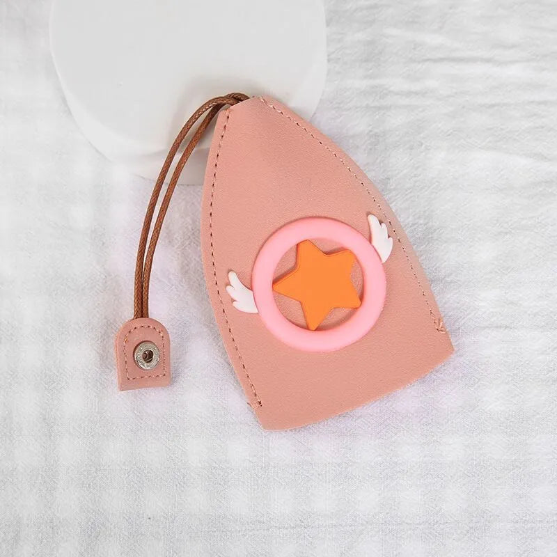Cartoon pull-out key case in PU leather showing pull-out mechanism and colourful design options