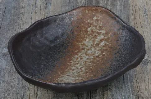 Irregular shaped coarse pottery sashimi bowl with floral decorations, measuring 24cm length, from Chaozhou porcelain