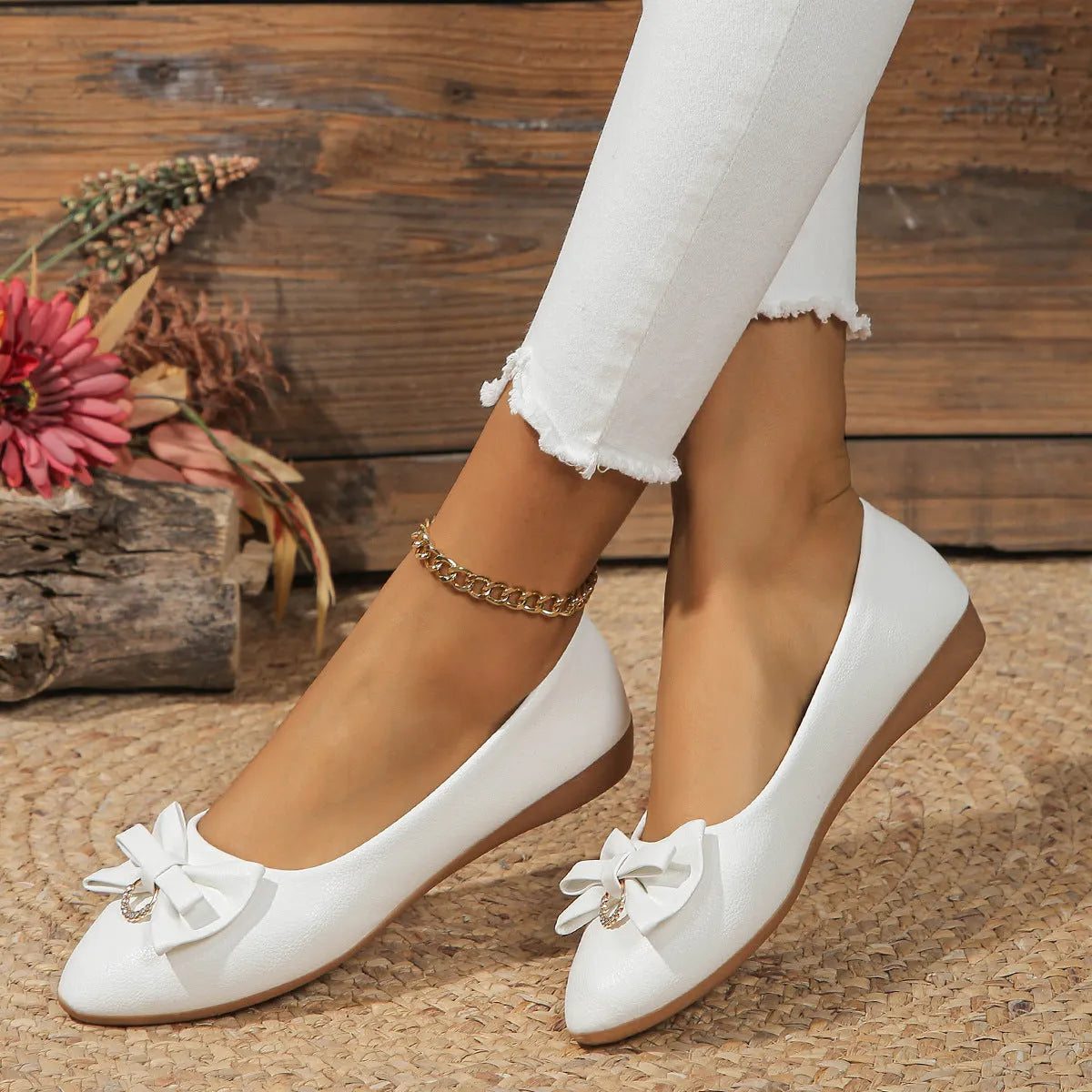 Women's flat casual shoes with bowknot detail and shallow mouth opening in beige colour