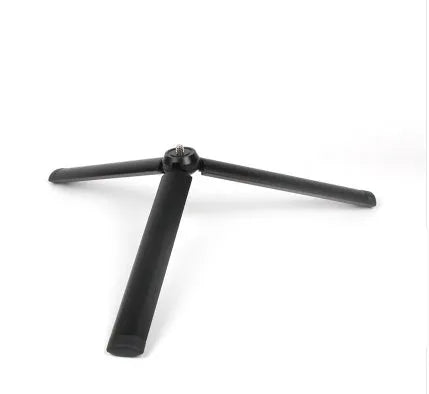 Black aluminium mobile phone tripod extended to 150cm height with 360-degree rotation capability