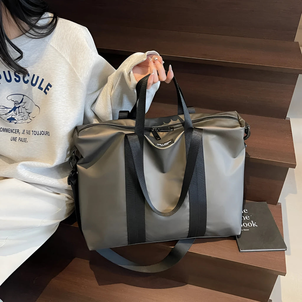 Lightweight Oxford cloth tote bag with 20-35 litre capacity in black colour option