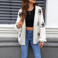 Women's jacquard knitted coat with floral pattern in beige and orange colours, loose fit cardigan design