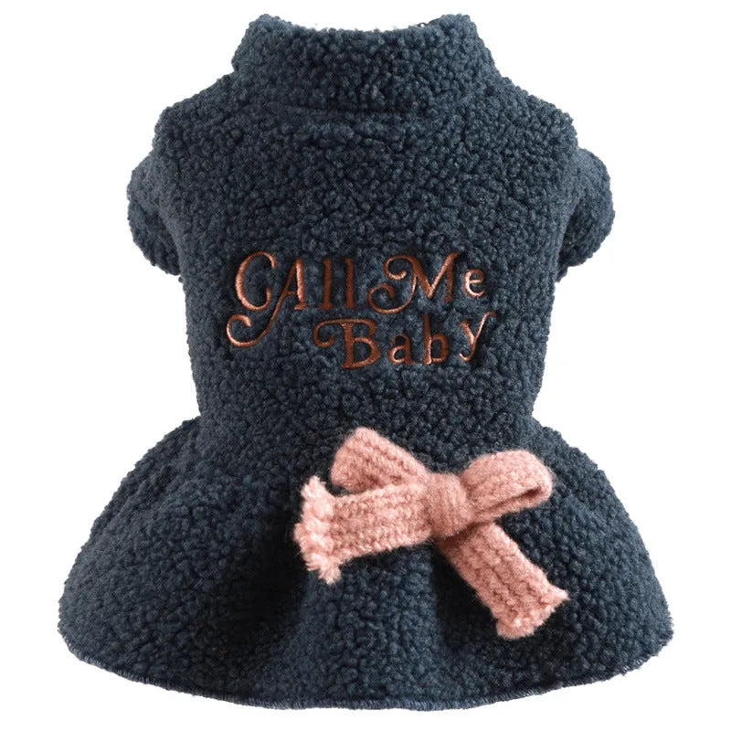 Pink fleece pet skirt with baby letter print for a small dog, showing size XS.
