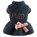 Pink fleece pet skirt with baby letter print for a small dog, showing size XS.