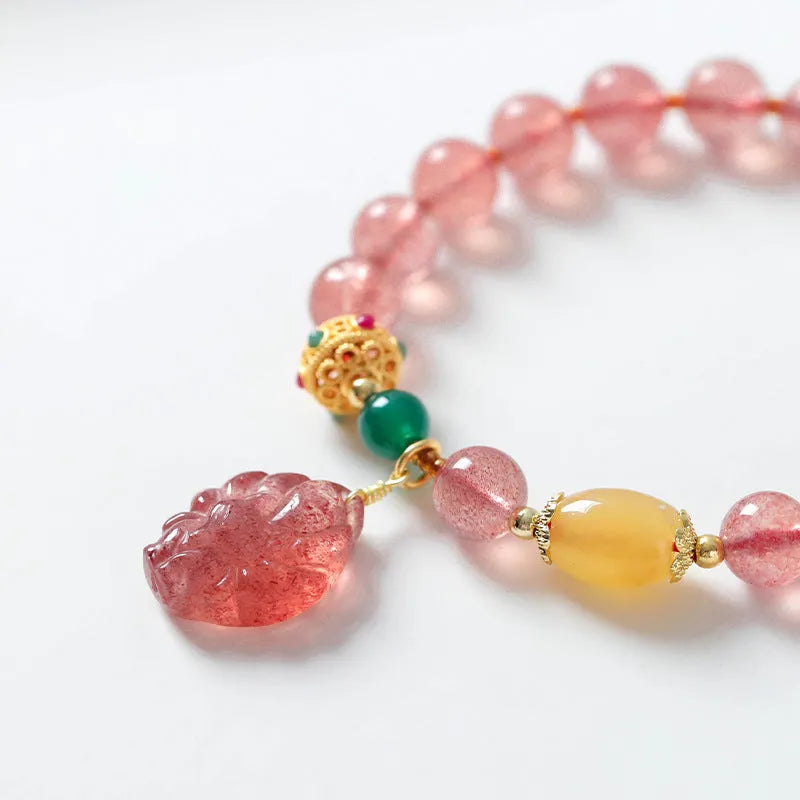Women's polished crystal bracelet with Nine Tail Fox beaded design on a wrist.