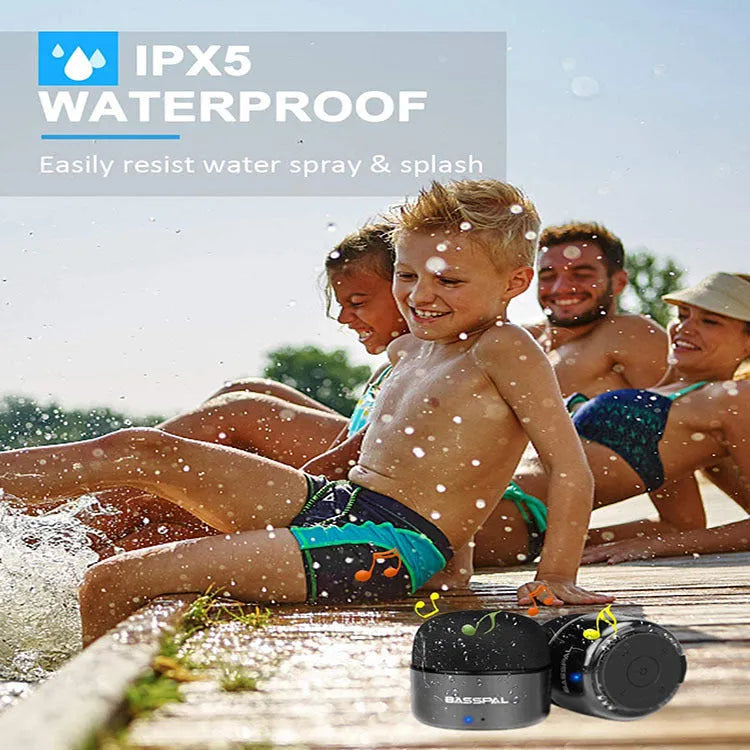 Black waterproof portable Bluetooth speaker showing dimensions and button controls