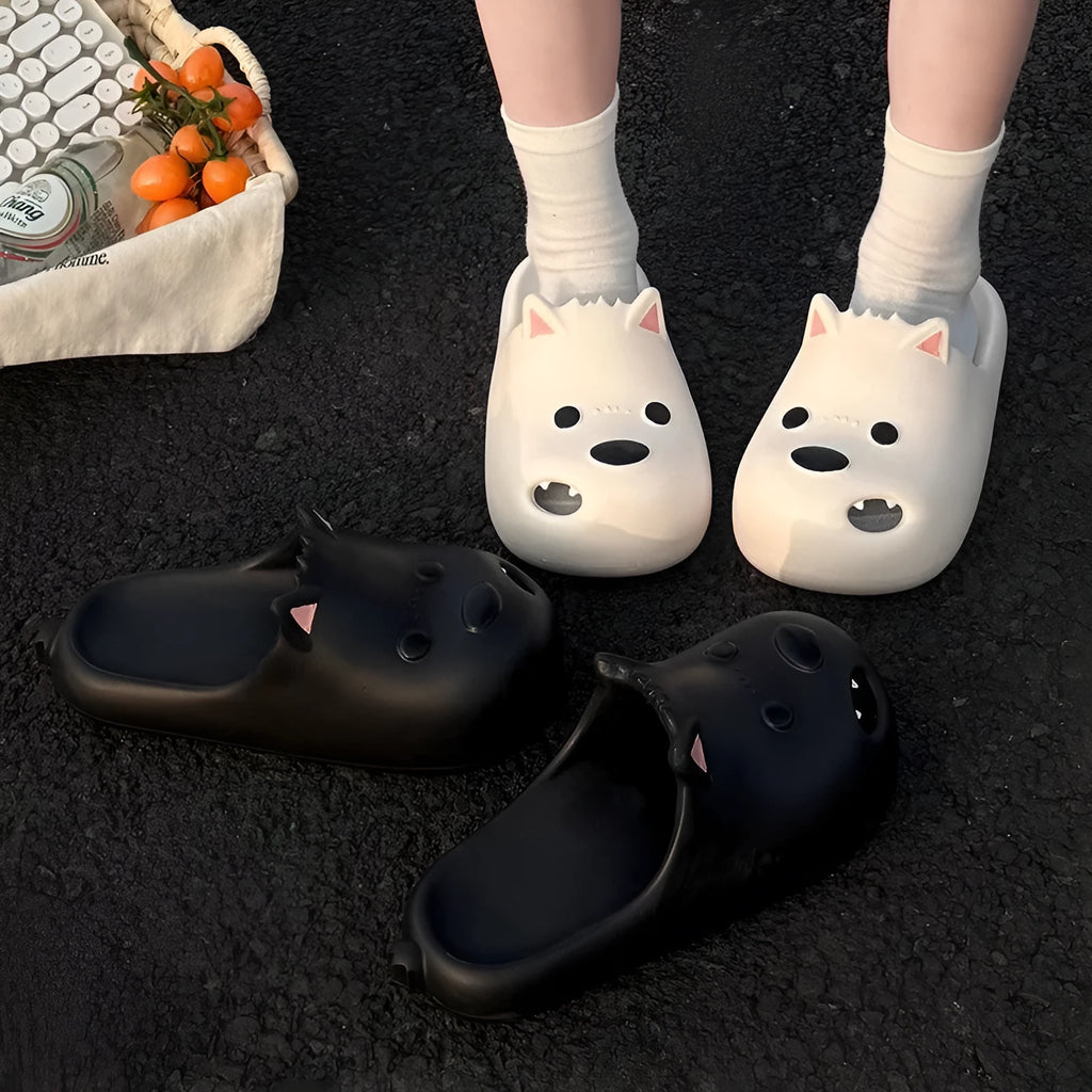 White women's EVA sandal slippers with a black puppy motif on the closed toe cap.