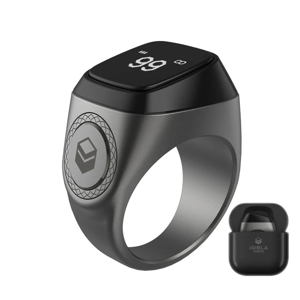 Zikr1 smart ring in silver with 0.49-inch OLED display showing time and Tasbih count on a finger